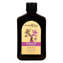 Black bottle of Earthly Body massage oil with a yellow label on a white background