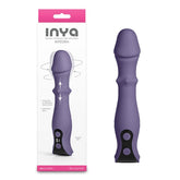 Purple Inya Integra vibrator with packaging on a white background