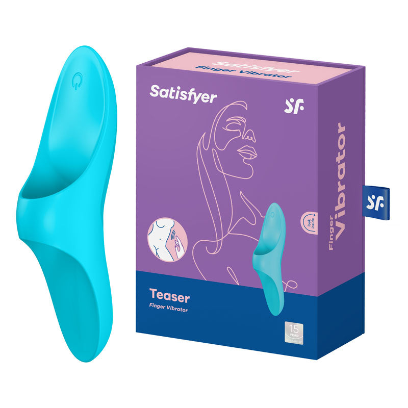 A blue Satisfyer Teaser finger vibrator is showcased beside its purple and blue packaging box, which displays an abstract line drawing of a woman's face along with the text "Waterproof Finger Vibrator" and "15-year warranty," making it perfect for stimulating any erogenous zone.