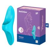 A blue Satisfyer Teaser finger vibrator is showcased beside its purple and blue packaging box, which displays an abstract line drawing of a woman's face along with the text "Waterproof Finger Vibrator" and "15-year warranty," making it perfect for stimulating any erogenous zone.