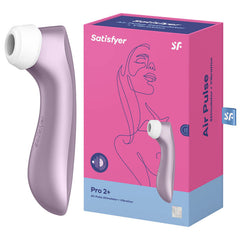 A pink Satisfyer Pro 2+ Air-Pulse Vibrator, featuring Air-Pulse Technology for clitoral stimulation, is shown next to its packaging box. The box displays an illustrated design of a woman's face and neck, with text highlighting the product's name, key features, and waterproof capabilities.