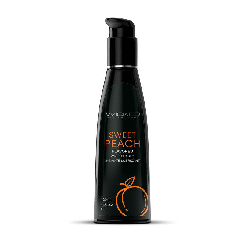 A black bottle labeled "Wicked Aqua Sweet Peach Water Based Lubricant - 120ml," adorned with an orange peach graphic, holds 120 ml (4.0 fl oz) of sweet peach lube and features a convenient pump dispenser on top.