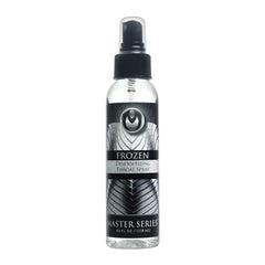 A 118 ml bottle of "Master Series Frozen - Deep Throat Desensitising Spray," infused with winter mint essence. The label features a black and white design with a circular emblem at the top, and the bottle is equipped with a black pump spray nozzle and a clear cap.