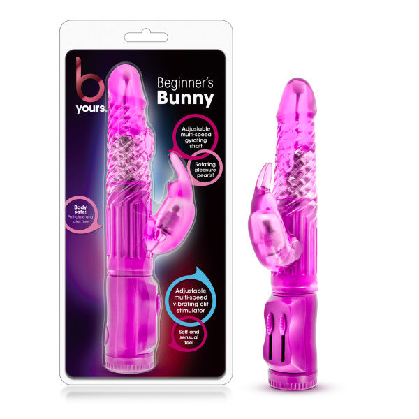 A packaging containing a pink, rabbit-shaped vibrator labeled "B Yours - Beginner's Bunny Rabbit Vibrator" is displayed. This transparent rabbit vibe features a curved tip for G-spot stimulation and clit-stimulating rabbit ears. The packaging highlights its multi-speed settings and soft, flexible texture.