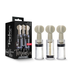The image shows three beige Temptasia Clit & Nipple Twist Suckers by Blush Novelties standing next to their black product box. Each adjustable suction cylinder features a cylindrical shape with a translucent section, showcasing their internal mechanism. The box reads "0.8 inch diameter" and "3 piece set.