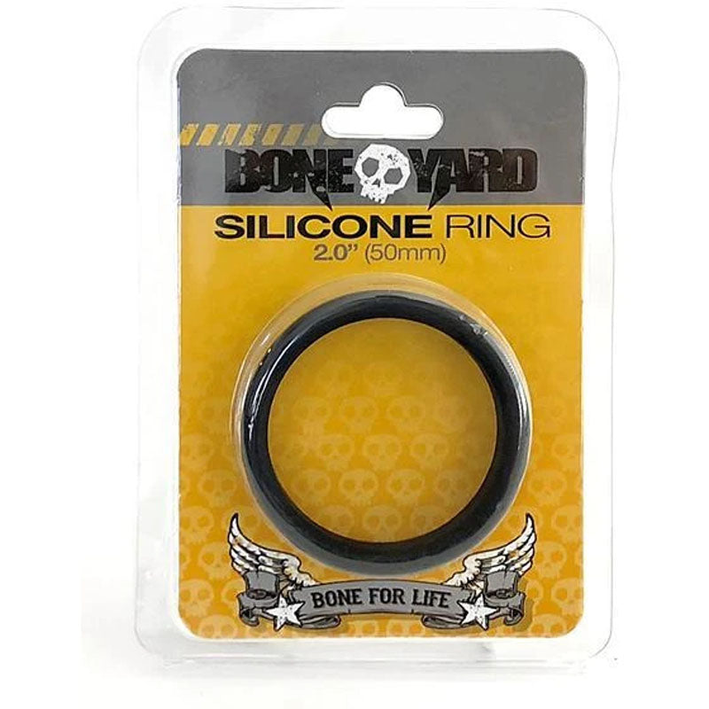 A packaged silicone ring labeled "Boneyard Silicone Cock Ring 50mm." Made from 100% silicone, the packaging is yellow with a skull design and features a banner with the text "Bone for Life" and winged skull illustrations at the bottom.