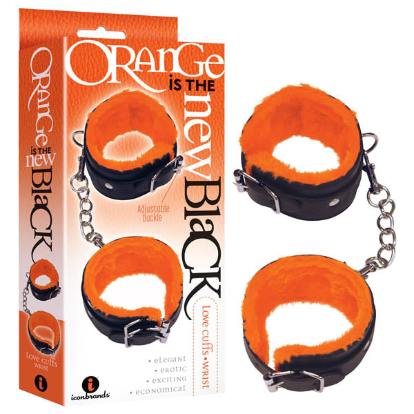 Image depicting the "Orange Is The New Black - Love Cuffs - Wrist - Black Fluffy Wrist Restraints." The cuffs are black with an orange lining, connected by strong chains and equipped with sturdy metal buckles. The packaging mirrors this design, showcasing the product name along with descriptions such as "elegant," "erotic," "exciting," and "economical.