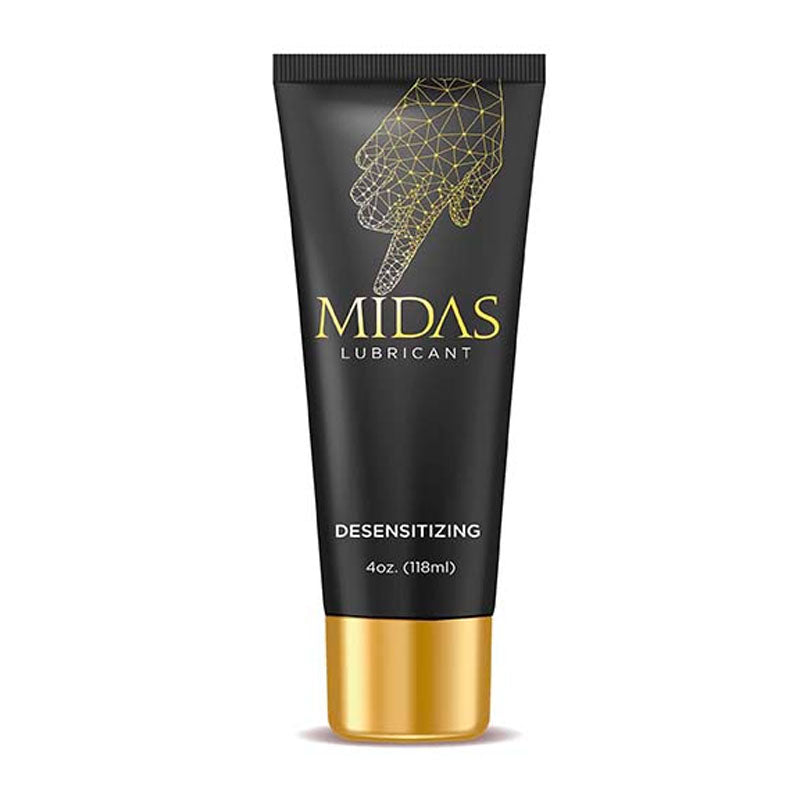 A 118 ml tube of Midas Desensitising Lubricant, adorned in black and gold, helps prolong sexual experience with its desensitizing properties. The tube features a geometric line drawing of a hand pointing down, along with the product name and capacity.