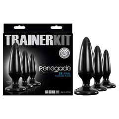 Image of a product package labeled "Renegade Pleasure Butt Plug Trainer Kit." The package includes three tapered black anal plugs of different sizes, arranged next to the box. The box features the brand name "Renegade" and mentions "3X Anal Pleasure Plugs," "Odorless TPE," and the sizes of the plugs.