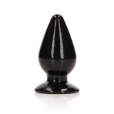 A black REALROCK 9 cm Anal Butt Plug with a cone shape and a flared base, resembling a suction cup, is shown against a white background.