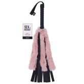 A black and pink faux fur flogger with a rose gold handle and vegan leather falls. The product is shown with a tag indicating 'Sex & Mischief'.
