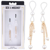 The image showcases "Sex & Mischief Pearl Nipple Ties," featuring an adjustable design with captivating faux pearls and gold chains. One set is displayed in its packaging, while the other set is shown unpackaged on the right.