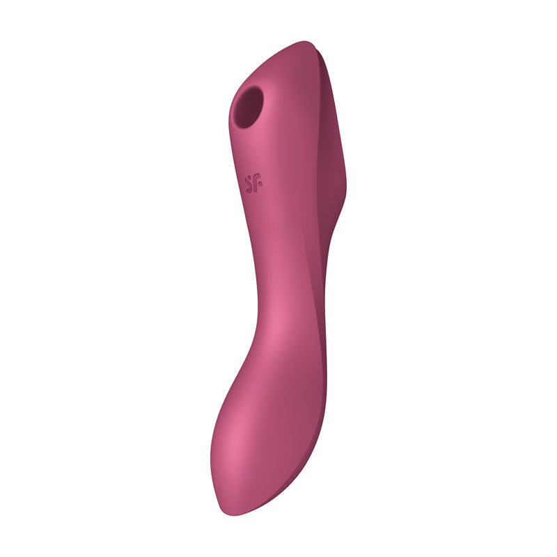 The Satisfyer Curvy Trinity 3 - Red is an ergonomically designed personal massager with a sleek, curved form and a small circular opening near the top. It features a matte finish and appears to be made of smooth silicone material, doubling as an effective G-spot vibrator.