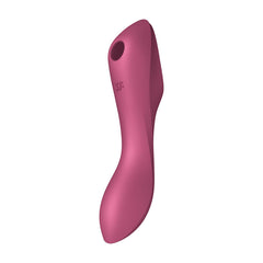 The Satisfyer Curvy Trinity 3 - Red is an ergonomically designed personal massager with a sleek, curved form and a small circular opening near the top. It features a matte finish and appears to be made of smooth silicone material, doubling as an effective G-spot vibrator.