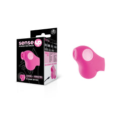 The Sense Up Licking Vibrator, a pink, USB rechargeable finger stimulator with white accents, is shown next to its packaging box. The black box features pink and white text and images, highlighting attributes such as "dynamic licking + vibrant vibrating rhythms" and "11 dynamic settings.