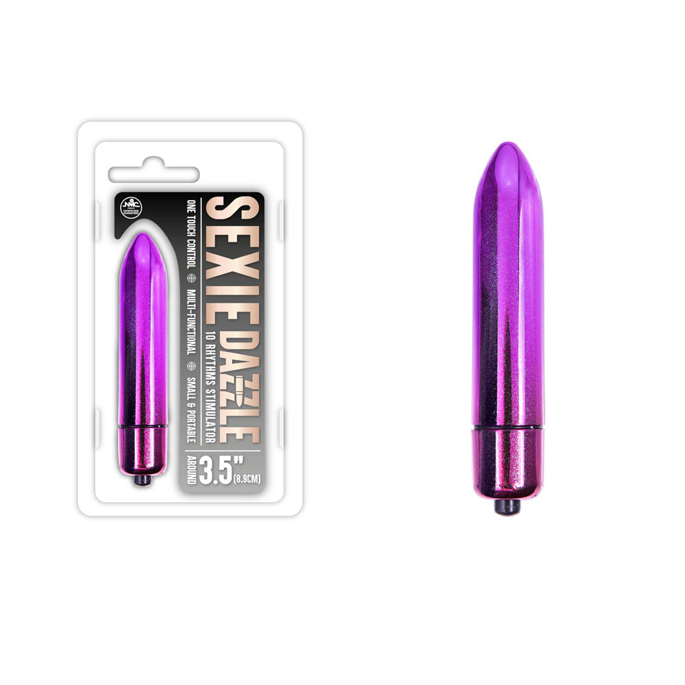 A small purple Sexie Dazzle Bullet Vibrator is shown. The product is displayed both in its packaging and as a standalone item. The packaging reads "SEXIE DAZZLE" and mentions the vibrator has a length of 3.5 inches, one powerful speed with vibrating rhythms, and a smooth metallic finish for effortless one-touch control.