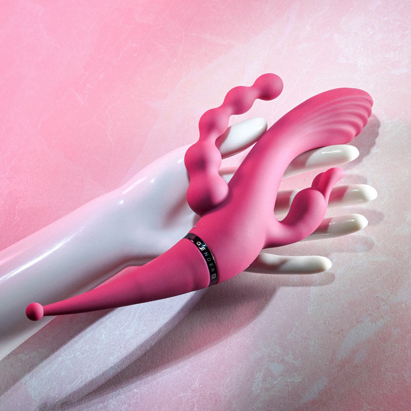 Pink and white massage tool on a pink background