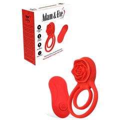 Red silicone ring with rose design next to its packaging on a white background