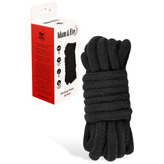 Black bondage rope with packaging on a white background