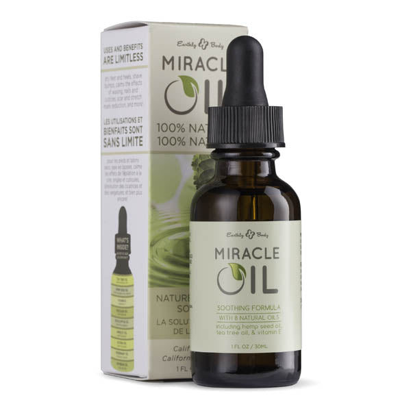 Bottle of Miracle Oil with dropper and packaging on a white background