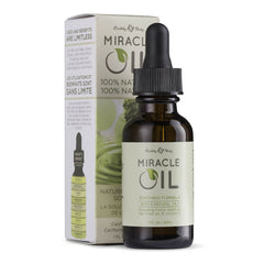 Bottle of Miracle Oil with dropper and packaging on a white background