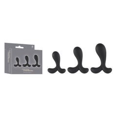 Set of black silicone butt plugs with packaging on a white background