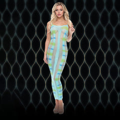 Woman wearing a colorful strapless jumpsuit against a dark textured background