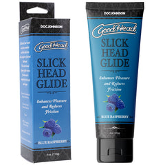 Here is an image of a tube and its packaging for "GoodHead Slick Head Glide - Blue Raspberry." This water-based glide, featuring a delightful blue raspberry flavor, is designed to enhance pleasure and reduce friction during sexual activities. The tube comes in black with blue labeling, and the packaging box showcases similar branding and product details.