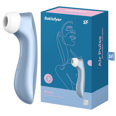 A blue product box labeled "Satisfyer Pro 2+ Air-Pulse Vibrator - Blue" shows a stylized outline of a woman's face and upper body. Next to the box is a light blue handheld device with a white tip, designed for air pulse stimulation and vibration. The Waterproof Satisfyer Pro 2+ features advanced Air-Pulse Technology for enhanced pleasure.