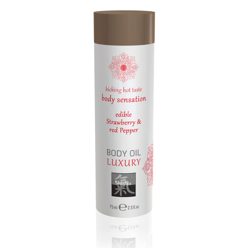 Bottle of SHIATSU Edible Strawberry Body Oil Luxury with a capacity of 75ml, featuring branding and decorative elements indicative of luxury and oriental aesthetics.