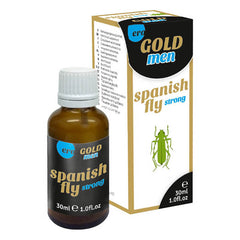 A small brown bottle with a white cap labeled "ERO Spanish Fly - Gold Men," accompanied by a box with the same label. The box, featuring a green insect illustration, suggests an aphrodisiac for an enhanced amorous experience. Both the bottle and the box indicate a volume of 30ml (1.0 fl oz).