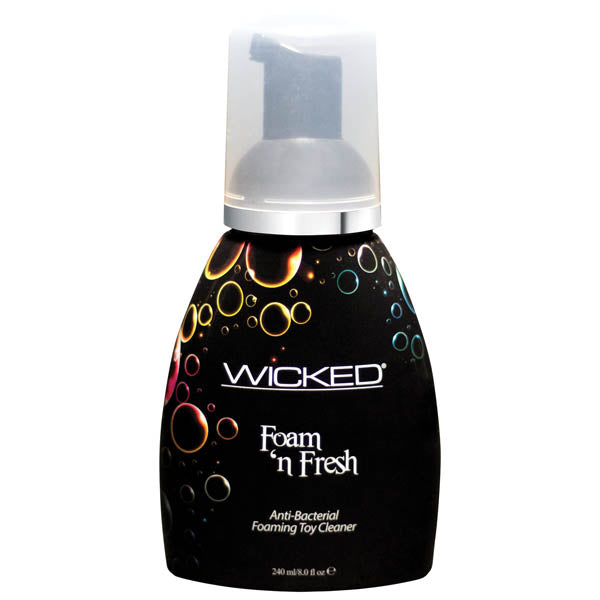 The product is a black bottle with a pump dispenser, labeled "Wicked Foam 'n Fresh Anti-Bacterial Foaming Toy Cleaner." The bottle showcases colorful bubble designs and has 240 ml (8.0 fl oz) of the triclosan-free cleaner, safe for all toy materials.