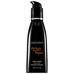 A black bottle of Wicked Aqua Heat, a water-based warming lube, designed for intimate use. Featuring a convenient pump dispenser, this sleek and minimalist 120 ml (4.0 fl oz) bottle is adorned with orange text on its label.