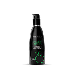 A black bottle of Wicked Aqua Candy Apple - Candy Apple Flavoured Water Based Lubricant, featuring a green apple graphic and green text indicating the product name. The bottle's pump dispenser top ensures easy use, while the label also shows the 60 ml (2 oz) volume. Enjoy a long-lasting experience!