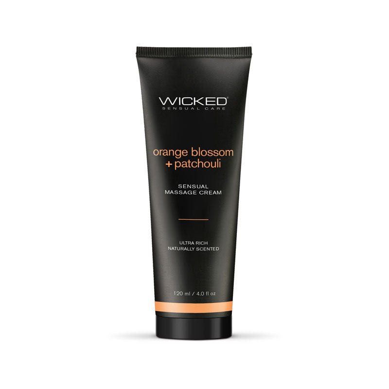A black bottle of Wicked ORANGE BLOSSOM + PATCHOULI Sensual Massage Cream promises ultra-rich skin hydration. The 120 ml (4.0 fl oz) bottle highlights its naturally scented formula, designed for a luxurious massage experience with an "orange blossom + patchouli" scent.