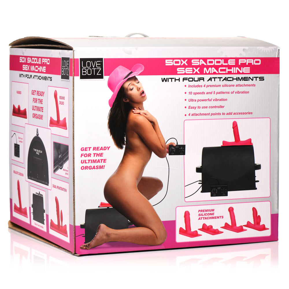The image shows the packaging for the LoveBotz 50X Saddle Pro Vibrating Sex Machine with premium grade silicone attachments. The box features images and text highlighting the product and its intense vibrations. A nude person wearing a pink hat is also depicted on the box.