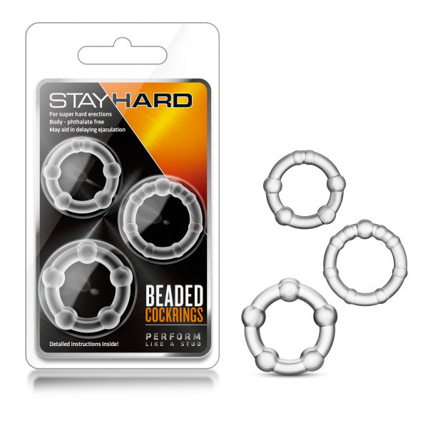 The image displays a package labeled "Stay Hard Beaded Cockrings." Inside, there are three body-safe TPE beaded rings crafted to enhance erections, boost size and stamina, and potentially delay ejaculation. Three Stay Hard Beaded Cockrings are also shown outside the package.