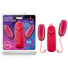 A retail product featuring two connected red vibrating eggs with a remote control. The packaging displays the brand name "blush" at the bottom and reads "Double Pop Eggs," showing the same items with text that promises "powerful multispeed vibrations" and "double the fun." This product is named B Yours Double Pop Egg Vibrator.