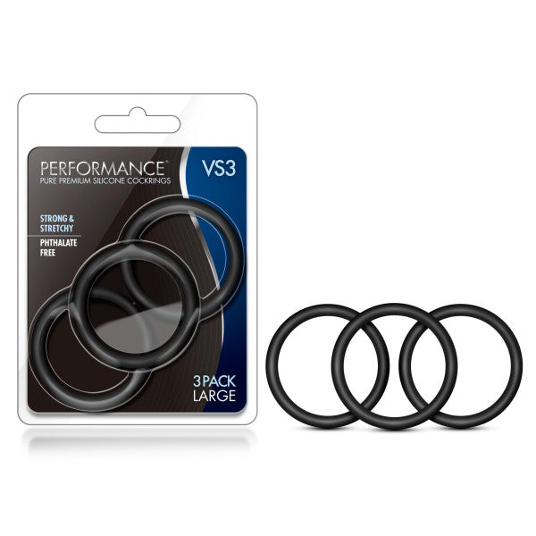 The image shows a package labeled "Performance VS3 Pure Premium Silicone Cock Rings" containing three black silicone cock rings with the description "Strong & Stretchy" and "Phthalate Free." Next to the package, three identical male enhancement rings are displayed outside of the packaging.