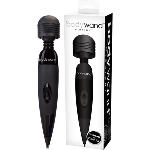 A black Bodywand Midnight Vibrator - Black Mains Powered Massage Wand is displayed next to its packaging box. The box showcases an image of the massager and includes text reading "bodywand MIDNIGHT," emphasizing its "Compact" size, "Powerful" nature, and strong stimulation capabilities. The massager features a rounded head, soft-touch surface, and a single control button.
