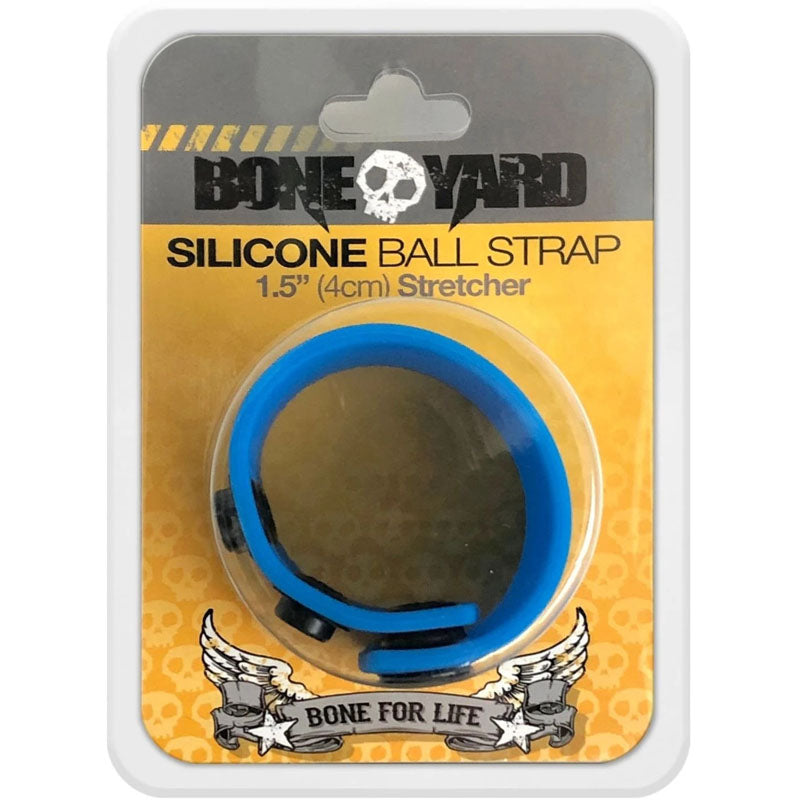 The image shows a Boneyard brand silicone ball strap packaged in a plastic clamshell. This Boneyard Silicone Ball Strap Blue Cock Ring, measuring 1.5 inches (4 cm) in diameter, is made from soft touch silicone. The packaging features a "Bone for Life" logo with wings and skulls, set against a yellow background with skull motifs.