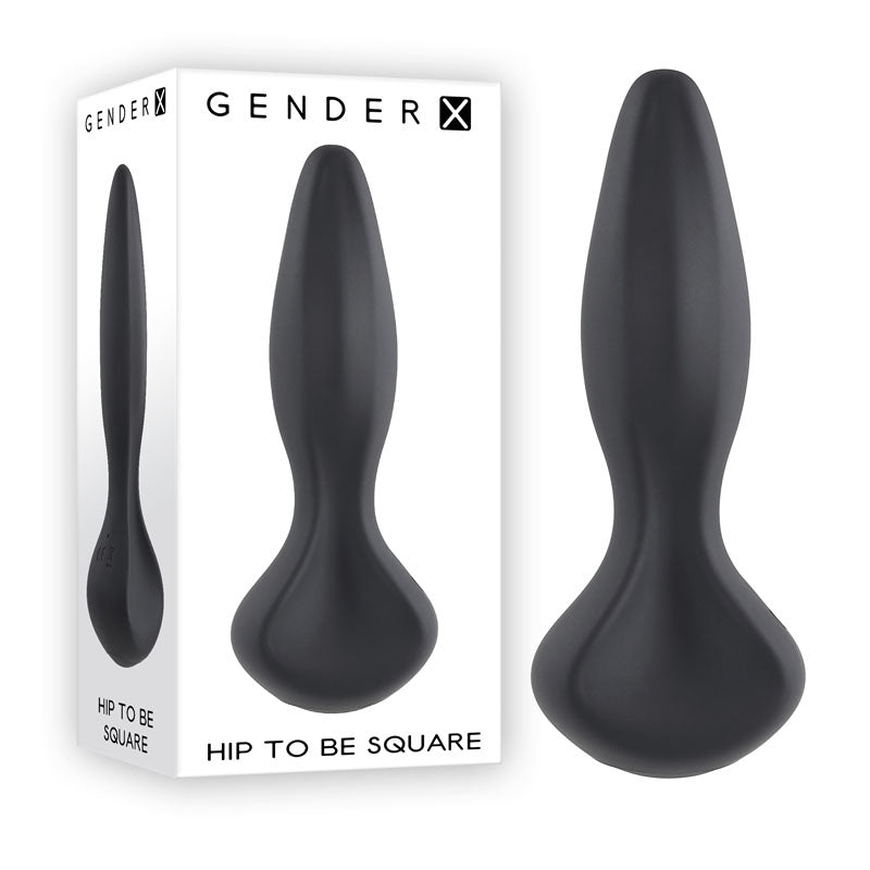 A black silicone toy with a distinctive bulbous shape is displayed against a white background. The waterproof toy is also shown in its packaging, which features the brand name "Gender X" and the product name "HIP TO BE SQUARE VIBRATING BUTT PLUG" in bold letters.