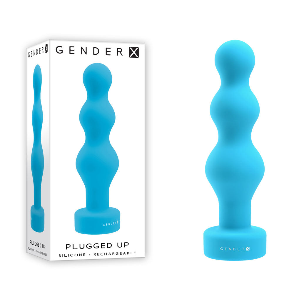 A blue, silicone, three-bulb butt plug with a flat base, displayed next to its white packaging. The packaging features an image of the toy and reads "Gender X PLUGGED UP Vibrating Anal Butt Plug" with the description "Flexible beaded vibrator – Phthalate & latex free silicone – 10 vibrating speeds.