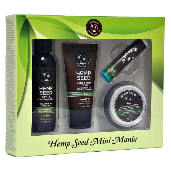 A boxed set labeled "Hemp Seed Mini Mania - Guavalava (Guava & Blackberry) Scented Lotion Kit - 4 Piece Set" contains four nutrient-rich hemp seed oil products: a bath & shower gel, hand & body lotion, lip balm, and 3-in-1 massage candle. The packaging features green leafy graphics and clear coverings that display the travel-approved sizes inside.