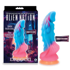 Introducing the Alien Nation - Glow Dragon Dildo, a fantasy-themed sex toy crafted from 100% silicone and designed to glow in the dark. The colorful blue and pink dildo comes packaged with vibrant, sci-fi artwork featuring bold "Alien Nation" and "Dragon" text, alongside the prominent "Primus" branding.