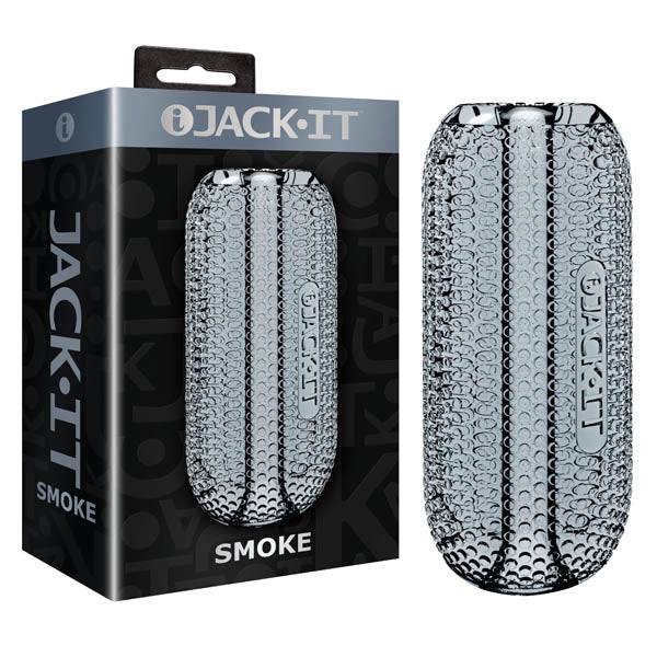 A product image of the Jack-It Stroker, showcasing a textured, grey cylindrical device along with its packaging. The predominantly black and grey packaging prominently features the brand name 'Jack-It' with 'Smoke' written at the bottom. The design is ergonomic and allows for easy cleaning.