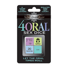 A product image depicting "Behind Closed Doors - 4 Oral Sex Dice" shows a pack of four dice. Each die is labeled with phrases such as "Lips & Ears," "20 Seconds," "Spread," and "Lick." The packaging highlights that it is "A game for lovers" designed to spice up your sex life. Roll them and get lucky!