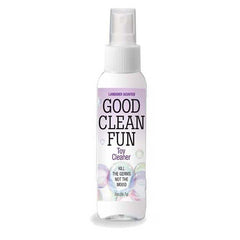 A white bottle of toy cleaner labeled "Good Clean Fun - Lavender" with "Lavender Scented" at the top. The slogan reads "Kill The Germs and Bacteria, Not The Mood." Designed for personal pleasure products, the 2 oz (56.7 g) bottle features bubbles to indicate cleanliness and freshness.