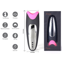 A Maia Piper is displayed alongside its box, showcasing a sleek black design with pink accents. Measuring 11.5 inches in height and 4.5 inches in width, this multi-function personal massager features medical grade silicone, 15 suction settings, rechargeable capabilities, a warming function, and is submersible. It also comes with a 1-year warranty.