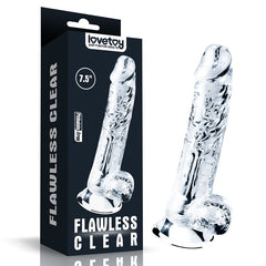 A transparent dildo with a realistic design is shown next to its black packaging box. The box, labeled "Flawless Clear Dildo 7.5''," presents the sex toy as 7.5 inches long, made by Lovetoy, and highlighting features like a strong suction cup base.